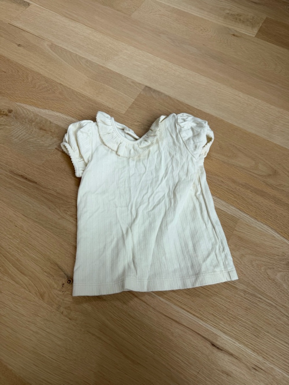 Minnow ruffle short sleeve shirt